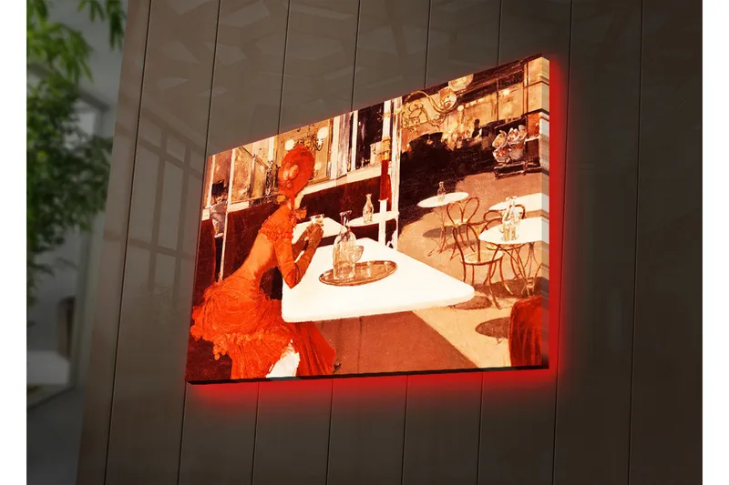 Canvas-taulu LED-valaistuksella 45x70 cm - Punamekkoinen nainen istuu kahvilapöydässä, Punainen / Beige / Ruskea