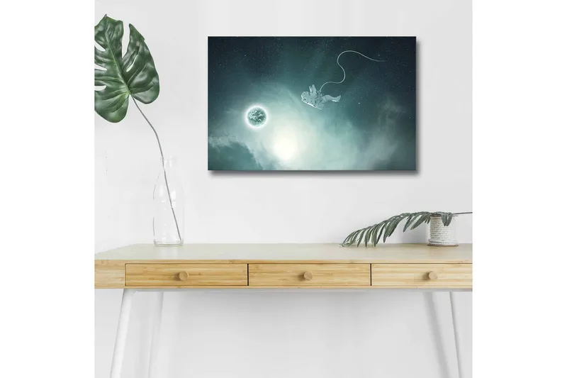 Canvas-taulu LED-valaistuksella - Astronautti leijuu avaruudessa planeetta taustalla, Tummansininen / Vihreä / Valkoinen