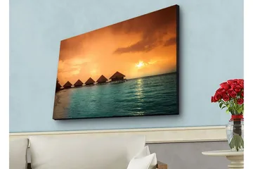 Canvas-taulu LED-valaistuksella - Auringonlasku trooppisen rannan yllä veden päällä olevien bungalowien kanssa - Oranssi / Turkoosi - Sisustustuotteet - Taulu & taide - Canvas-taulu