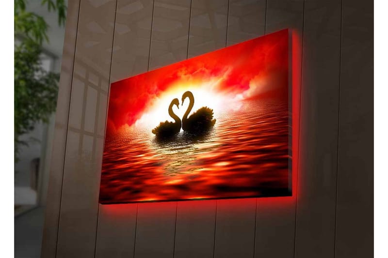 Canvas-taulu LED-valaistuksella - Kaksi joutsenta muodostaa sydämen dramaattista auringonlaskua vasten - Punainen / Musta / Oranssi - Sisustustuotteet - Taulu & taide - Canvas-taulu