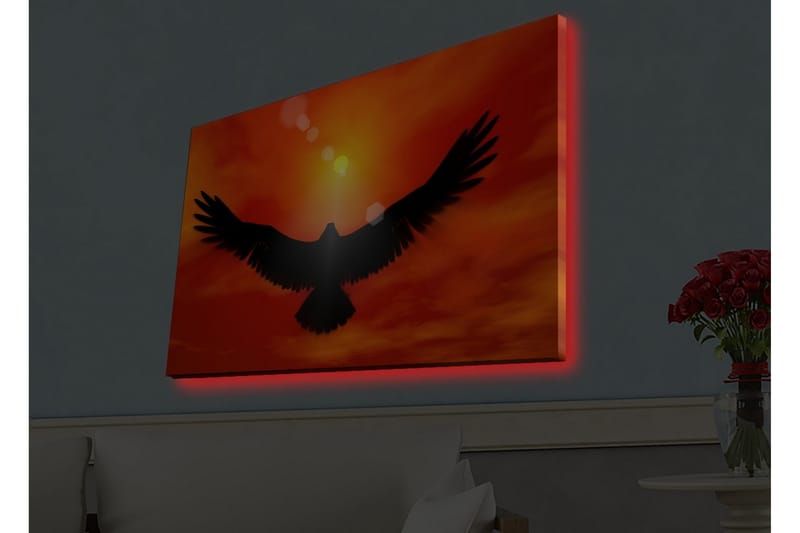 Canvas-taulu LED-valaistuksella - Kotkan siluetti lentää kohti auringonlaskua kirkkaissa väreissä - Punainen / Musta / Oranssi - Sisustustuotteet - Taulu & taide - Canvas-taulu