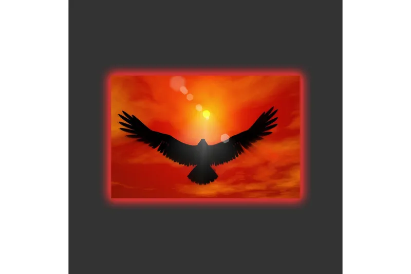 Canvas-taulu LED-valaistuksella - Kotkan siluetti lentää kohti auringonlaskua kirkkaissa väreissä - Punainen / Musta / Oranssi - Sisustustuotteet - Taulu & taide - Canvas-taulu