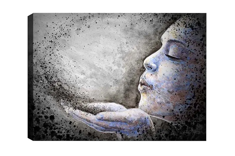 Canvas-taulu - Muotokuva naisesta puhaltamassa hiukkasia käsistään, Harmaa / Sininen / Musta