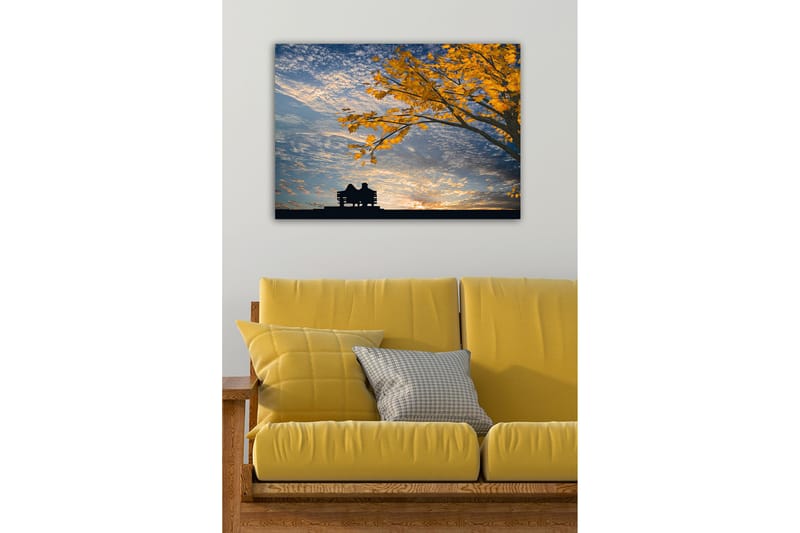Canvas-taulu - Pariskunnan siluetti istumassa penkillä puun alla kultaisten syksyn lehtien keskellä - Kulta / Sininen / Musta - Sisustustuotteet - Taulu & taide - Canvas-taulu