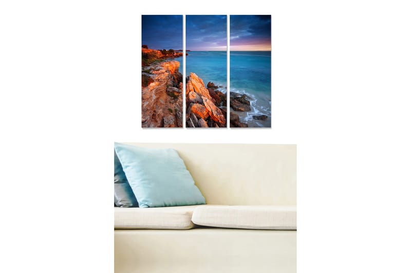 Puinen canvas-taulu, 3 osaa, 50x70 cm - Kivinen rannikko meren rannalla hämärässä, Sininen / Oranssi / Harmaa