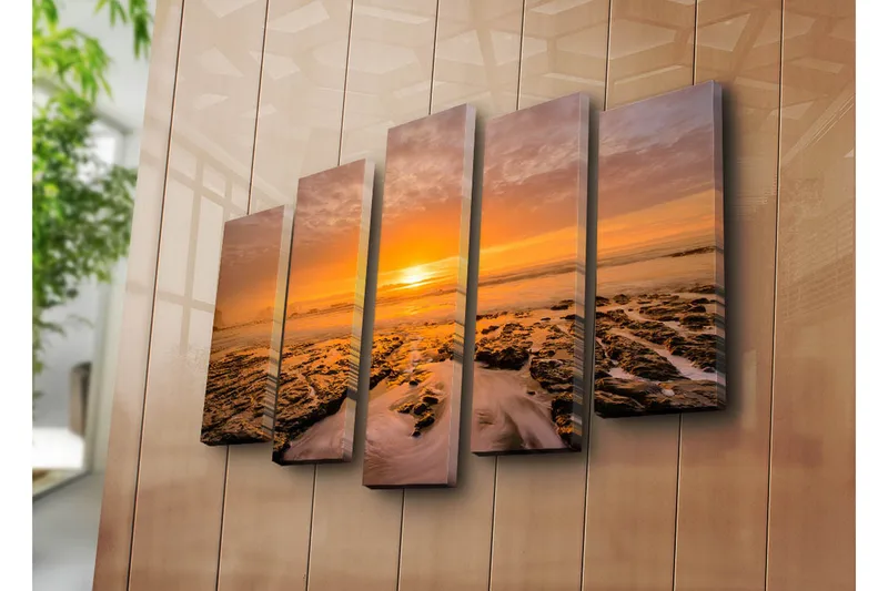 Suuri 5-osainen canvas-taulu, 105x70 cm - Auringonlasku meren yllä, etualalla kalliomuodostelmat - Oranssi / Musta / Harmaa - Sisustustuotteet - Taulu & taide - Canvas-taulu