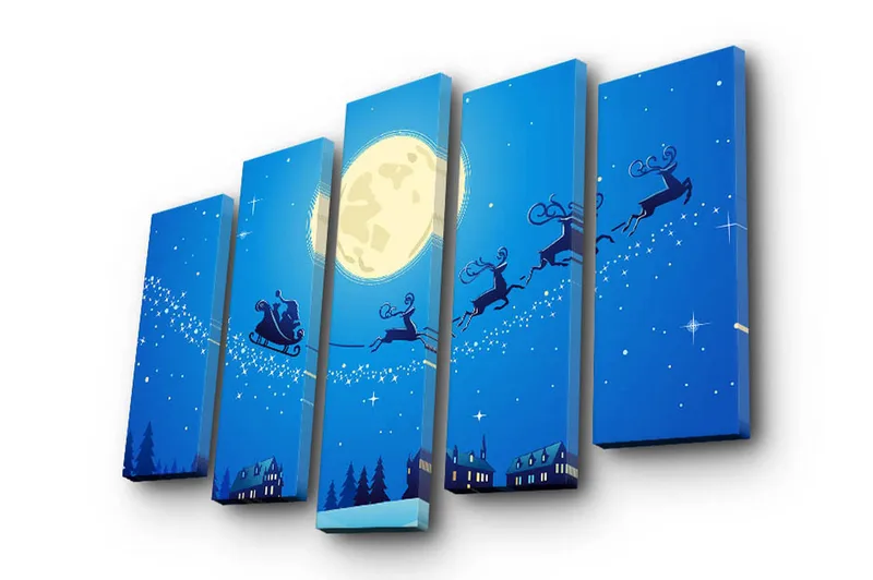 Suuri 5-osainen canvas-taulu, 105x70 cm - Jouluy ö, jossa joulupukki lentää kaupungin yllä porojen kanssa reessä, Tummansininen / Vaaleansininen / Valkoinen