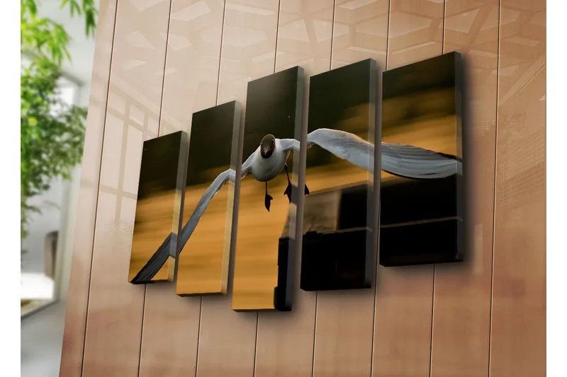 Suuri 5-osainen canvas-taulu 105x70 cm - Lentävä lokki kultaisessa hämärässä - Valkoinen / Musta / Kultainen - Sisustustuotteet - Taulu & taide - Canvas-taulu