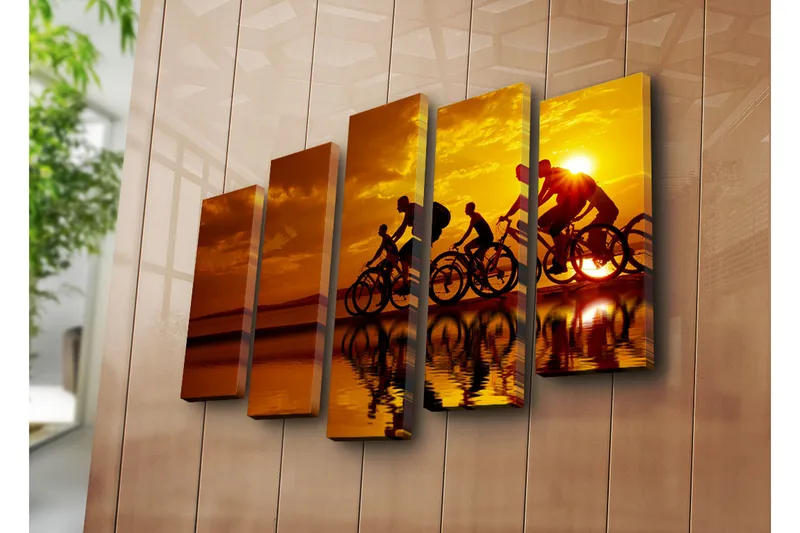 Suuri canvas-taulu, 5 osaa, 105x70 cm - Pyöräilijöiden siluetteja auringonlaskua vasten - Kulta / Oranssi / Musta - Sisustustuotteet - Taulu & taide - Canvas-taulu