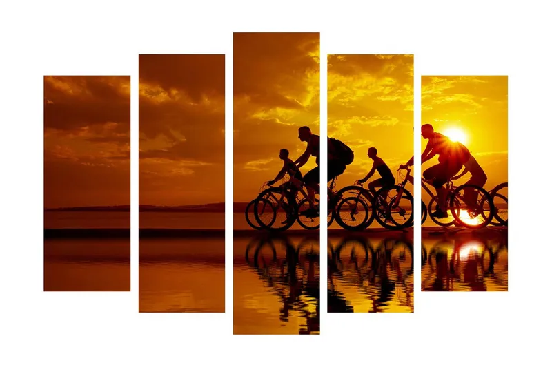 Suuri canvas-taulu, 5 osaa, 105x70 cm - Pyöräilijöiden siluetteja auringonlaskua vasten, Kulta / Oranssi / Musta