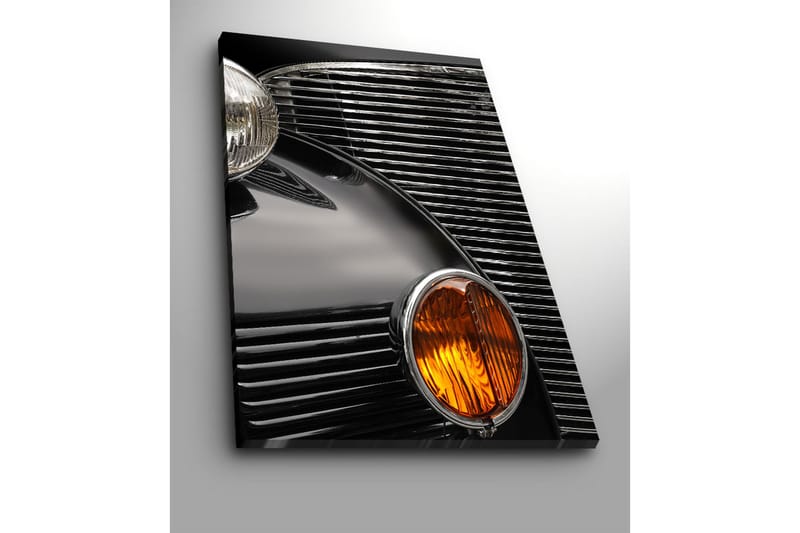 Suuri canvas-taulu 70x100 cm - Yksityiskohtainen lähikuva klassikkoauton keulasta - Musta / Kromi / Oranssi - Sisustustuotteet - Taulu & taide - Canvas-taulu