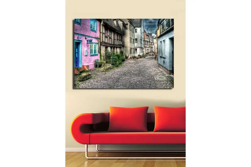 Suurikokoinen canvas-taulu 100x70 cm - Värikäs katu viehättävine taloineen viehättävässä kylässä - Vaaleanpunainen / Sininen / Harmaa - Sisustustuotteet - Taulu & taide - Canvas-taulu